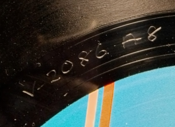 Flesh coloured Virgin logo on labels